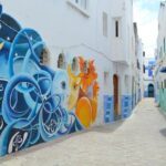 The Blue City Morocco artistic mural on a blue wall