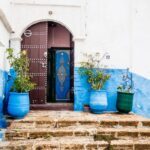 The blue city Morocco arch entryway and decorated door