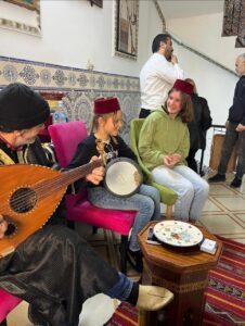 Local Moroccan musician playing for tourists