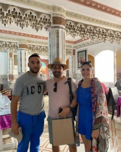 Omar and happy clients shopping in Tangier