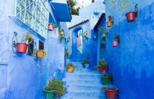 the blue city Morocco stair well colorful pottery